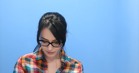 Image showing woman smiling wearing on a pair of large glasses