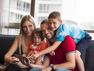 Image showing young cuple spending time with kids