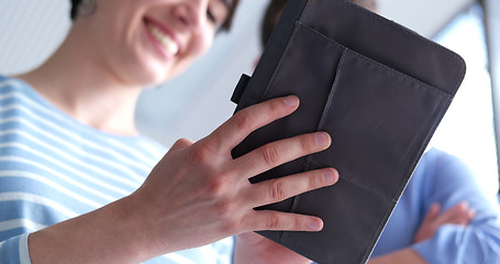 Image showing low angle shot of business people using technology