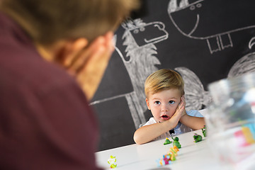 Image showing Cute little toddler boy at child therapy session.