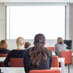 Image showing Audience in the lecture hall listening to academic presentation.