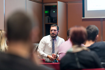 Image showing Speaker Giving a Talk at Business Meeting.