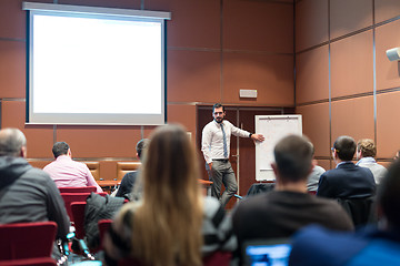 Image showing Speaker Giving a Talk at Business Meeting.