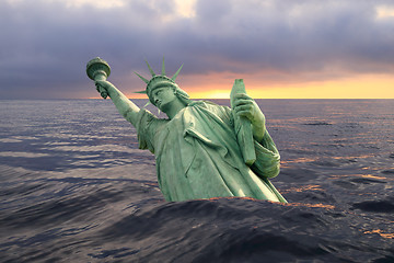 Image showing Statue of Liberty sinking in the ocean