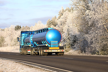 Image showing Blue Tank Truck on Winter Highway