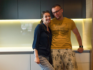 Image showing Young couple in the kitchen