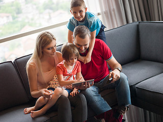 Image showing young cuple spending time with kids