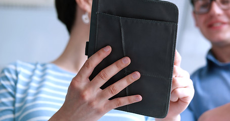 Image showing low angle shot of business people using technology