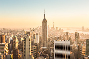 Image showing New York City skyline with urban skyscrapers at sunset, USA.