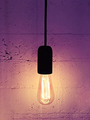 Image showing Industrial design light bulb on a black cord