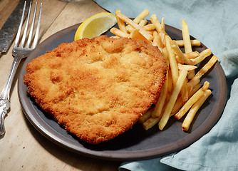 Image showing Weiner Schnitzel with fried Potatoes