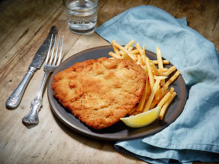 Image showing Weiner Schnitzel with fried Potatoes