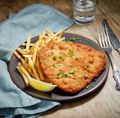Image showing Weiner Schnitzel with fried Potatoes