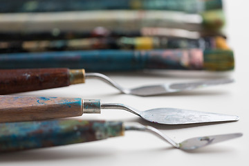 Image showing palette knives or painting spatulas and brushes