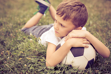 Image showing Portrait of a young  boy with soccer ball.