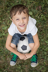 Image showing Portrait of a young  boy with soccer ball.