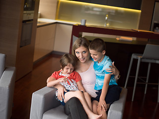 Image showing Young Family Using A Tablet To Make Future Plans