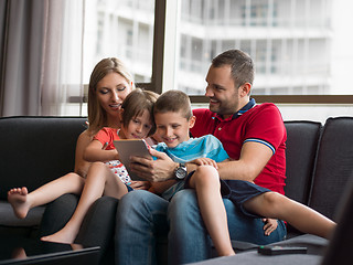 Image showing young cuple spending time with kids