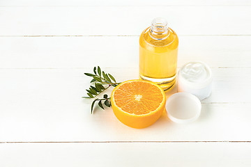 Image showing Spa concept with salt, mint, lotion, towel on white background