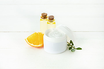 Image showing Spa concept with salt, mint, lotion, towel on white background