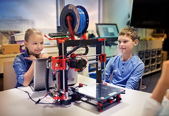 Image showing happy children with 3d printer at robotics school