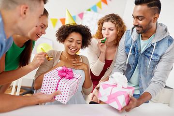 Image showing team greeting colleague at office birthday party