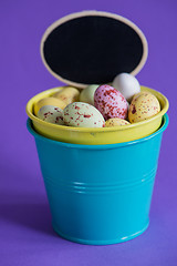 Image showing Easter eggs in a bucket