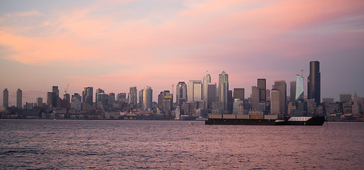 Image showing Pink Sunset Cargo Ship Puget Sound Downtown Seattle Skyline