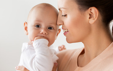 Image showing happy mother with little baby boy at home