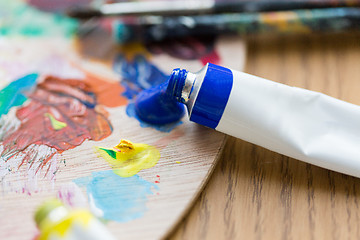 Image showing acrylic color or paint tubes and palette