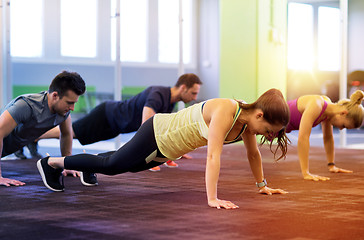 Image showing group of people exercising in gym