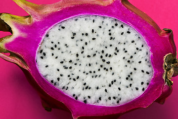 Image showing A longitudinal section of a ripe dragon fruit