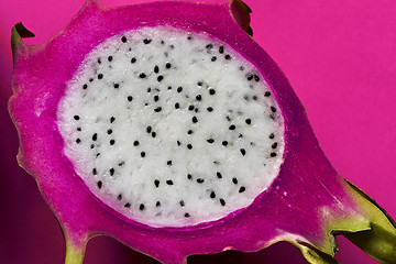 Image showing A longitudinal section of a ripe dragon fruit