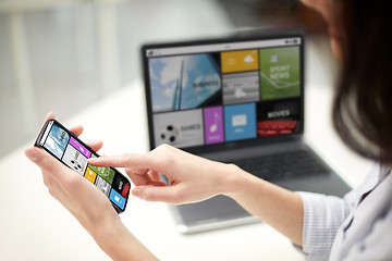 Image showing close up of woman with smartphone at office