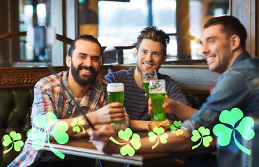 Image showing friends taking selfie with green beer at pub