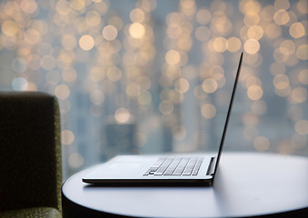 Image showing close up of laptop computer on table at christmas