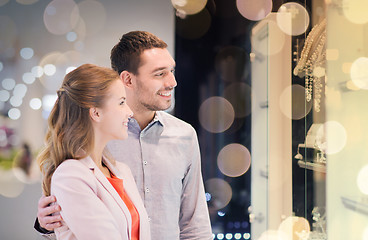 Image showing couple looking to shopping window at jewelry store