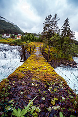 Image showing Suspension bridge over the mountain river, Norway.