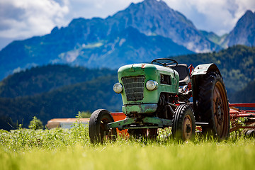 Image showing Old tractor in the Alpine meadows