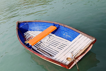 Image showing Old wooden boat on the lake