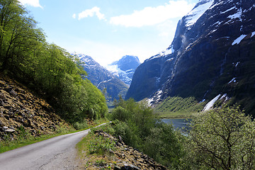 Image showing The narrow and winding road leads into the glacier in Loen, Stry