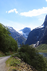 Image showing The narrow and winding road leads into the glacier in Loen, Stry