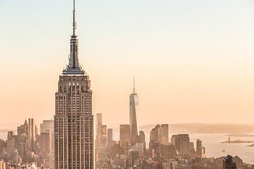 Image showing New York City skyline with urban skyscrapers at sunset, USA.