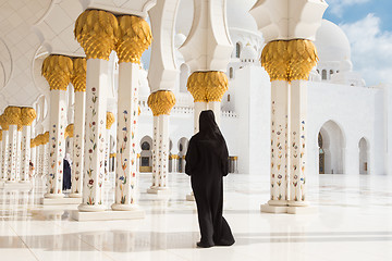 Image showing Arabic woman in black burka in Sheikh Zayed Grand Mosque, Abu Dhabi, UAE.