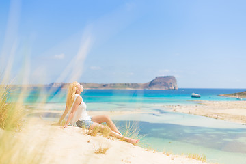 Image showing Relaxed Happy Woman Enjoying Sun on Vacations.