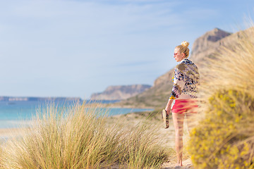 Image showing Free Happy Woman Enjoying Sun on Vacations.