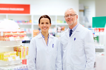 Image showing happy apothecaries at pharmacy