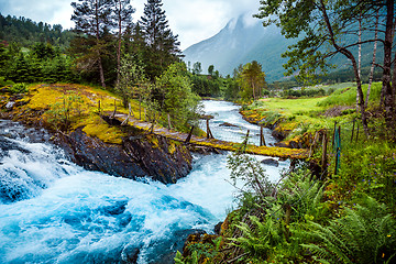 Image showing Suspension bridge over the mountain river, Norway.