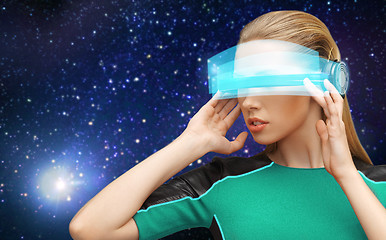 Image showing woman in virtual reality glasses over space