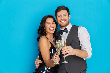 Image showing happy couple with champagne glasses at party